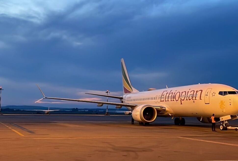 Ethiopian Airlines plane parked at Entebbe International Airport in Uganda at dusk